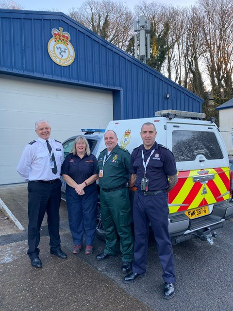 Pictured: Sgt David Cook (Metropolitan Police Service), Jane Kelly (Emergency Planning Officer, Isle of Man), Keith Sharpe (East Midlands Ambulance Service) and Terence Griffin (Tyne and Wear Fire and Rescue Service) outside an Isle of Man Civil Defence building